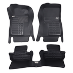 Set of black car floor mats on a white background